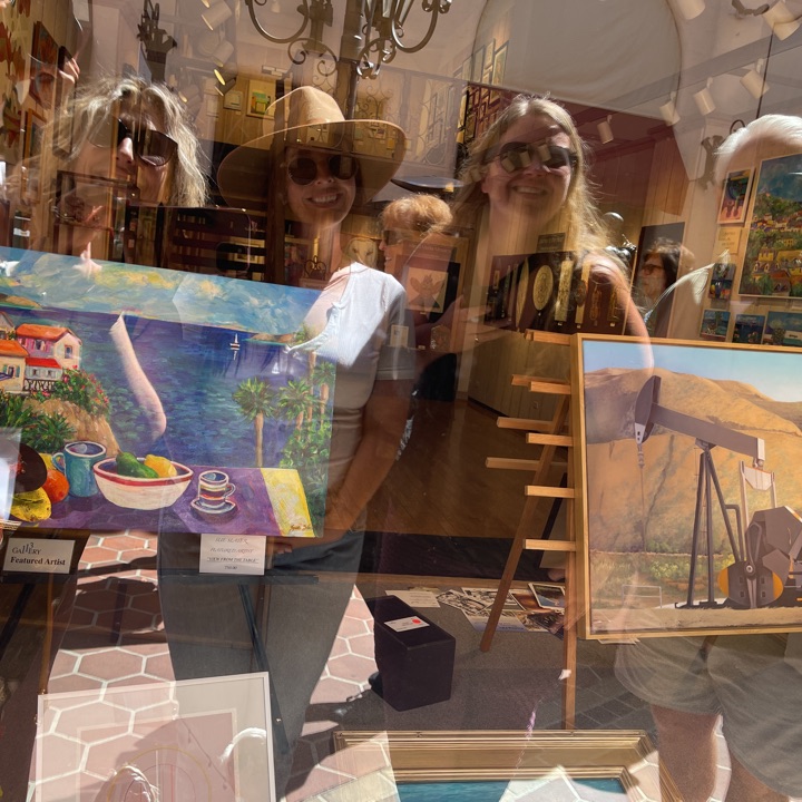Scavenger hunters admiring a storefront
